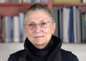 Roshi Joan Halifax looks at the camera.
